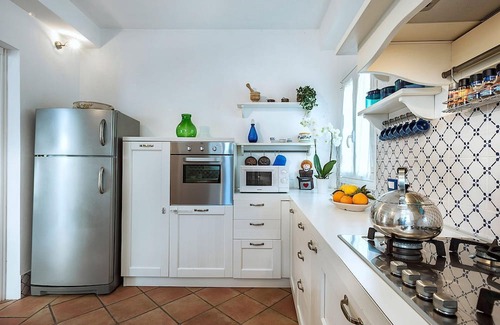 Marsala House | My Rental Homes - Casa Tika with shared pool surrounded by a wonderful garden