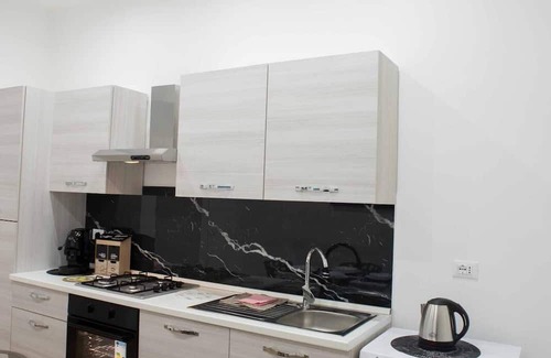 Albergheria Apartment | Short-term rentals Yris House structured new a few meters from the historic center