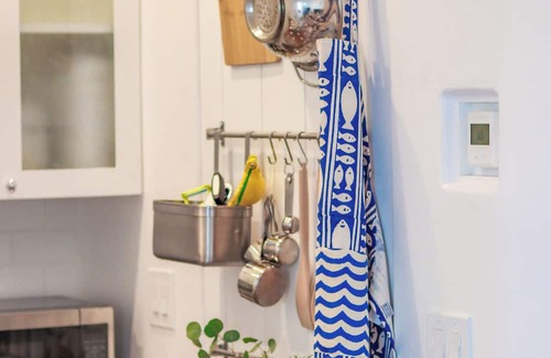 Middletown Cottage | MONTHLY Santorini-inspired Walk-out Cottage w/Private Patio, Fireplace + Jacuzzi