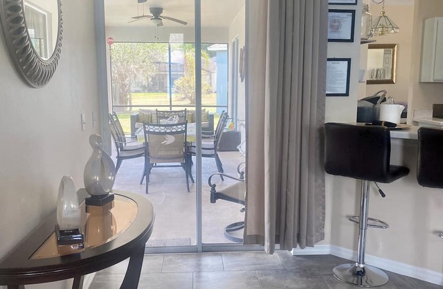 Charming 3-bedroom house with AC, fitness room, WiFi in Kissimmee