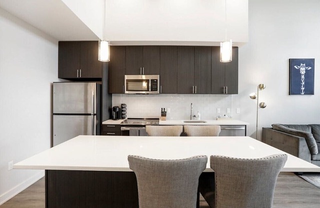Welcome to our luxurious 2-bed, 2-bath apartment in the heart of McLean Commons!