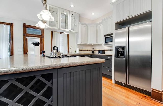 Spacious & sun-filled retreat with a large patio, game room, & great location