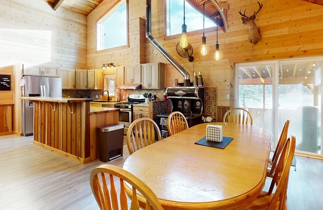 Waterfront custom-built home with screened-in porch & gas fireplace