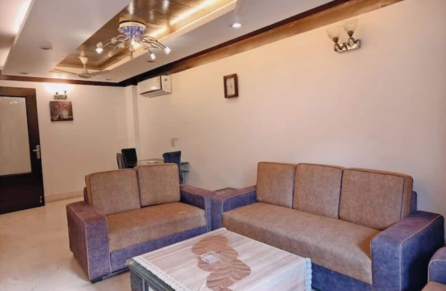 1BHK- GK 1 near Market by HostMyStay
