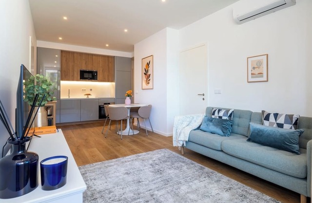 Sleek and Modern Flat w/Private Garage by HostWise