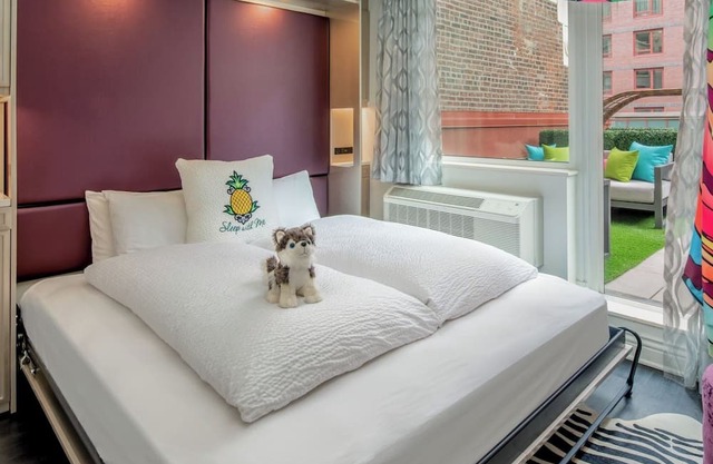 Vibrant Terrace Escape with Stylish Decor and Relaxing Outdoor Space in Midtown