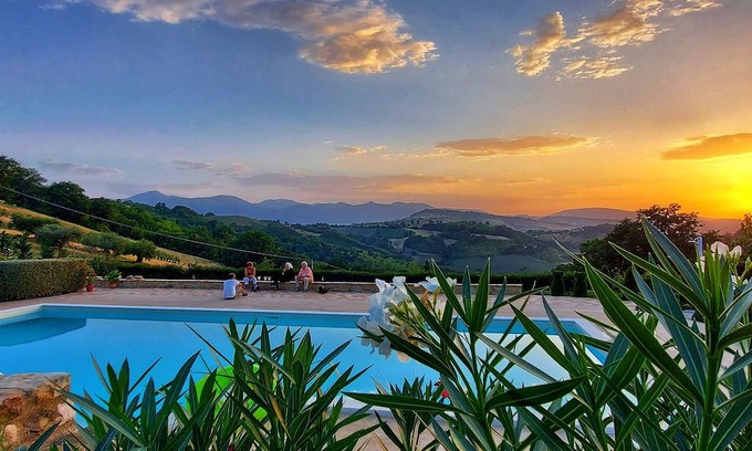 Penna San Giovanni House | San Isidore, a meticulously restored historic Italian home with a stunning pool.