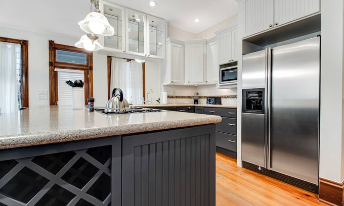 West End House | Spacious & sun-filled retreat with a large patio, game room, & great location