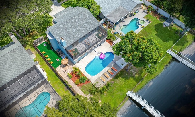 On Top of The World House | Spacious Lakefront pool retreat in Clearwater less than 20 min to beaches