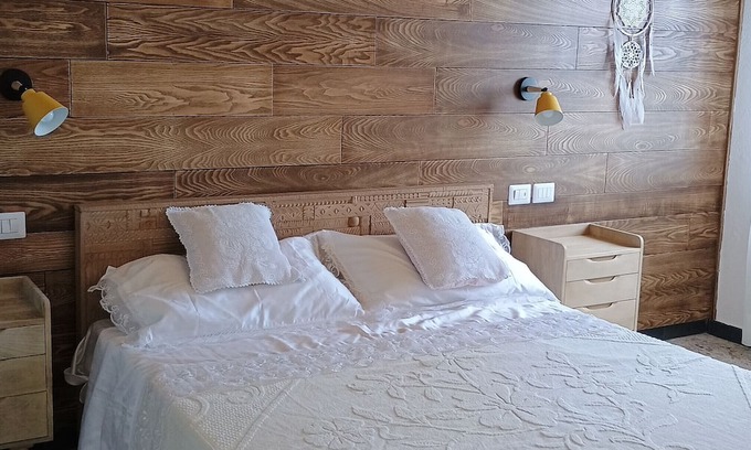 Villagrande Strisaili House | Holiday Home 'Sa Omu 'Eccia' with Sea View and Private Terrace